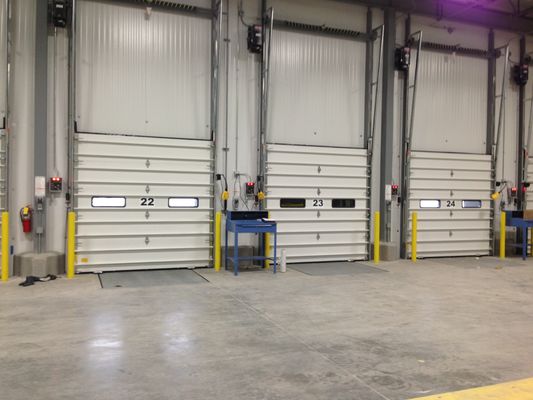 12 Kaki Exterior Roll Up Insulated Workshop Dock Doors Industrial Vertical PU Panel