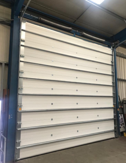 High Security Lock Fire Station Industrial Sectional Doors with Automatic Formed and Emergency Release Fireproof Rolling Shutter Door Exporters Pengekspor